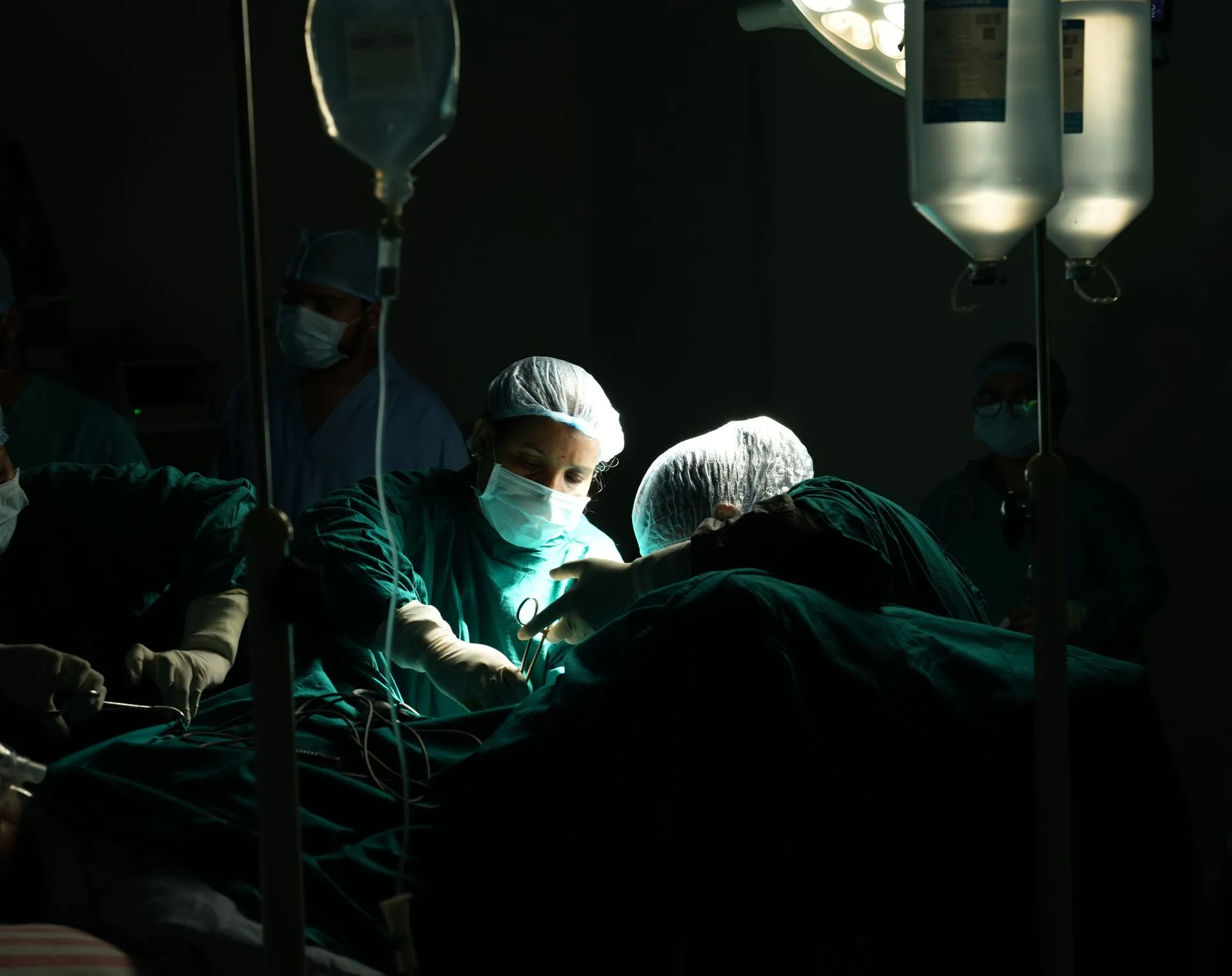 Surgeons performing an operation
